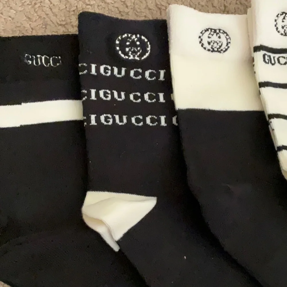 Gucci Men's Black and White Striped Socks Collection
